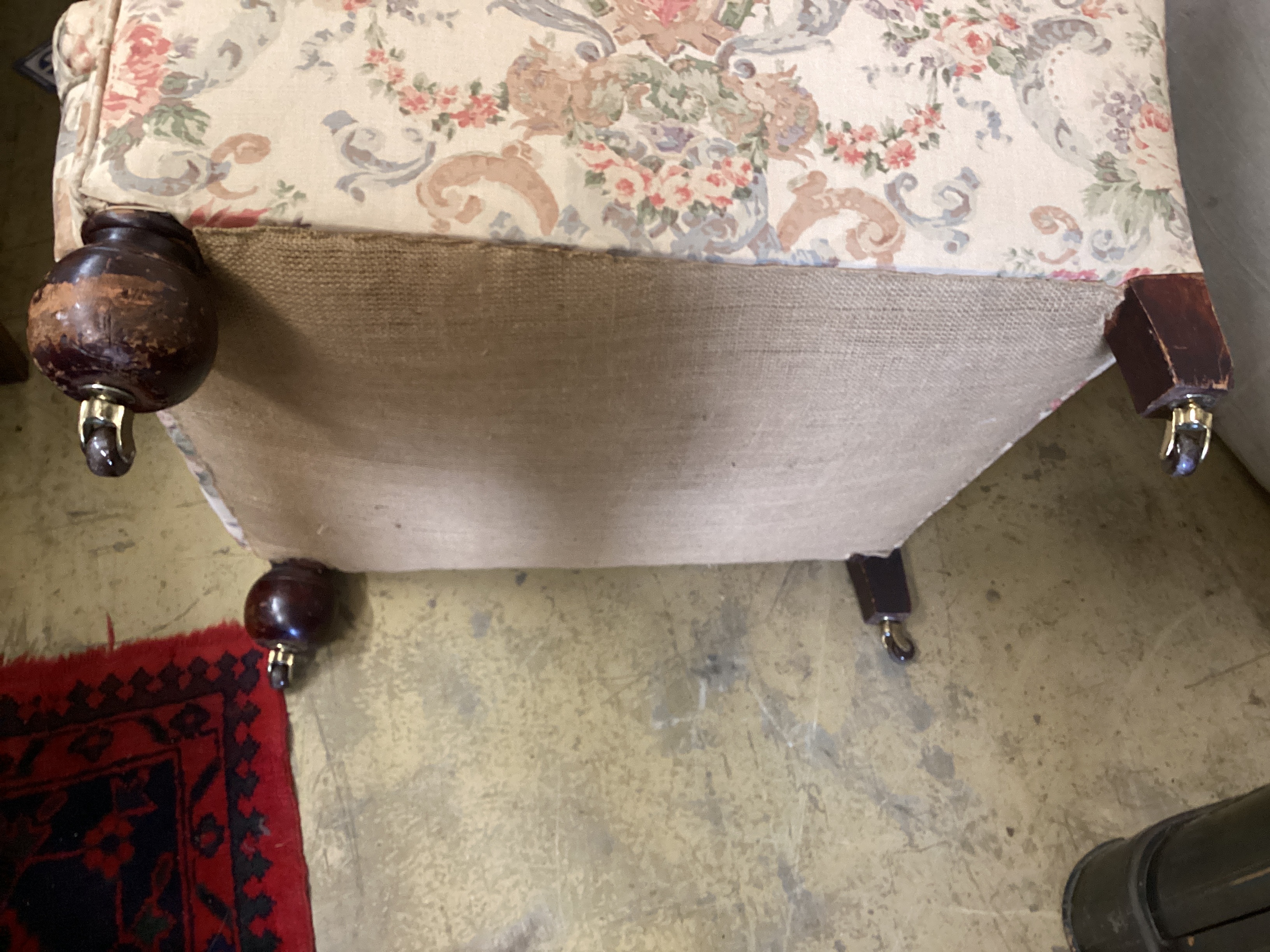A pair of early 20th century upholstered armchairs, width 82cm, depth 86cm, height 76cm